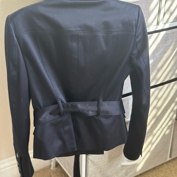 Burberry London Biker Jacket
BlackStand Collar, Flap Pockets & Snap Closure - Picture 6 of 6